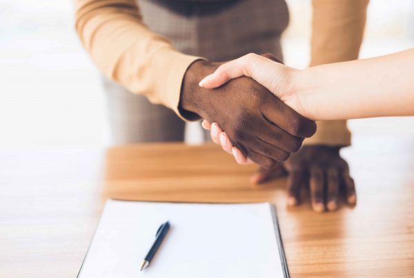 Commercial law solicitor in London reviewing a business contract with a UK business client at Judge Law.