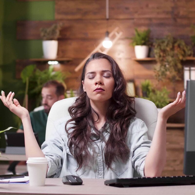 A supportive workplace meeting discussing mental health and wellbeing.