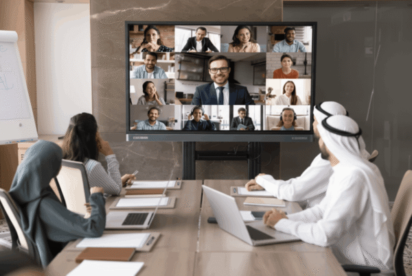 London business owner reviewing UK sponsor licence application with team.