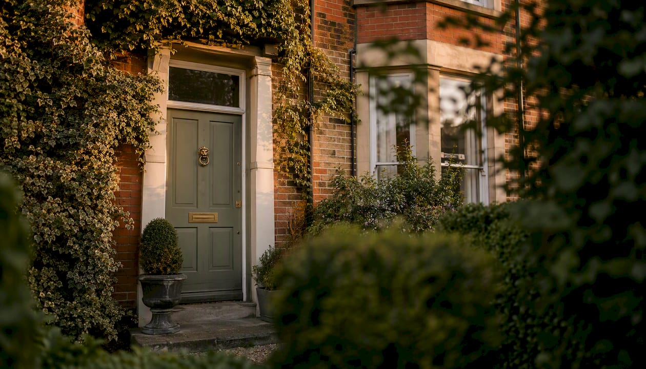Red-brick UK house front door close-up