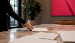 Close-up of employment contract and letter in UK office