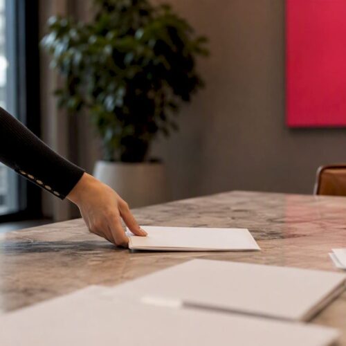 Close-up of employment contract and letter in UK office