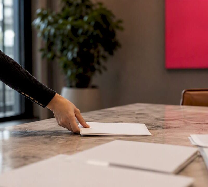 Close-up of employment contract and letter in UK office